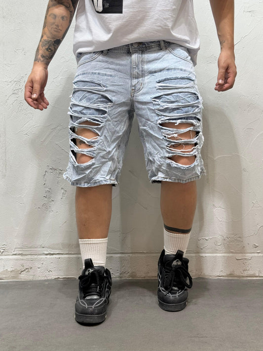 SHORT RIPPED JEANS