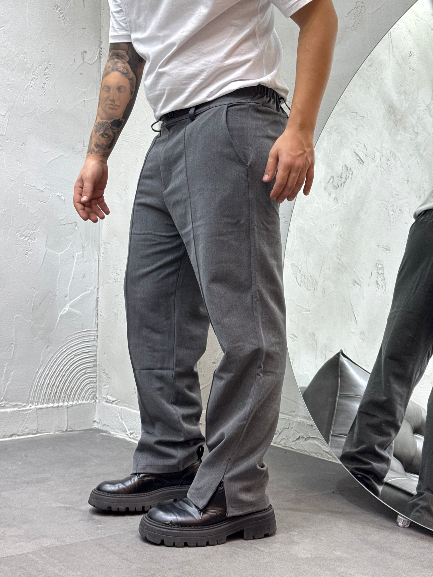 PANTALONE FONDO AMPIO CON ZIP GREY