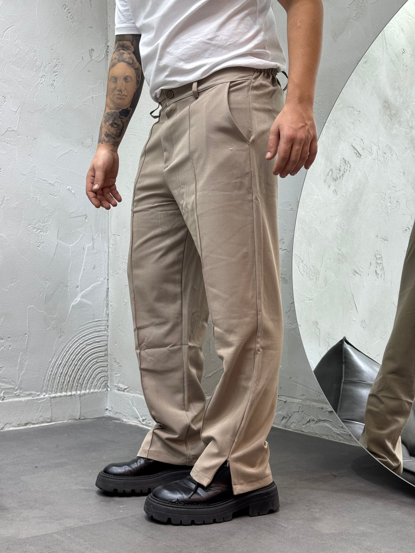 PANTALONE FONDO AMPIO CON ZIP BEIGE